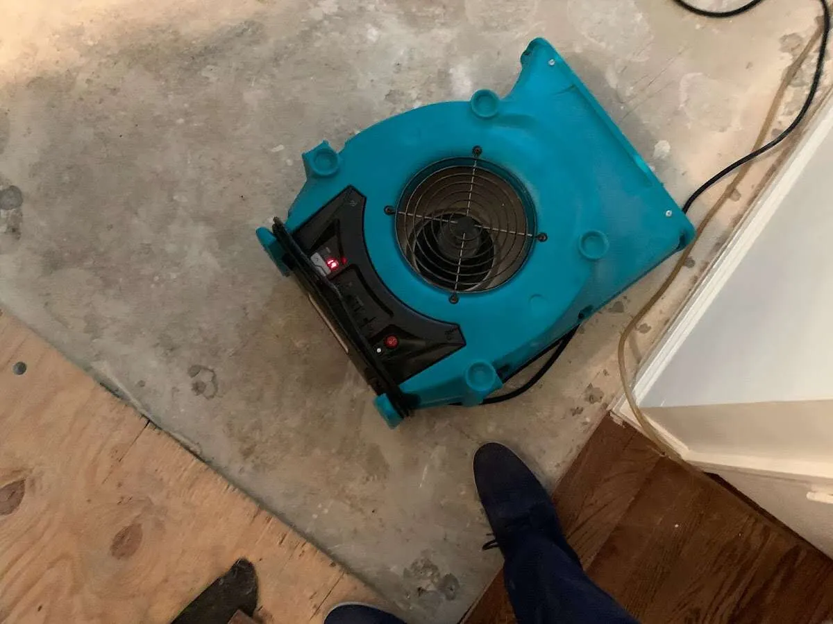 Air mover drying subfloor during Leak Detection & Repair in Skiatook